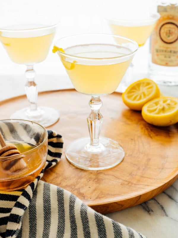 The bee's knees is a classic gin cocktail with lemon and honey