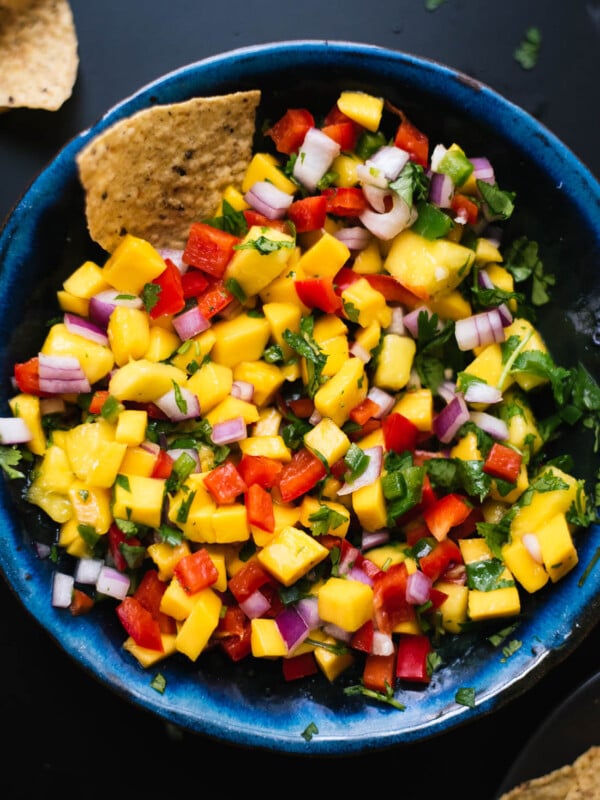 Fresh mango salsa recipe, perfect for tacos, potlucks and more! cookieandkate.com