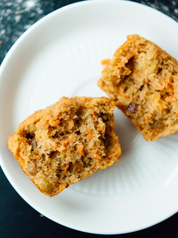 Healthy carrot muffins that taste amazing! These are made with whole wheat flour and sweetened with maple syrup!