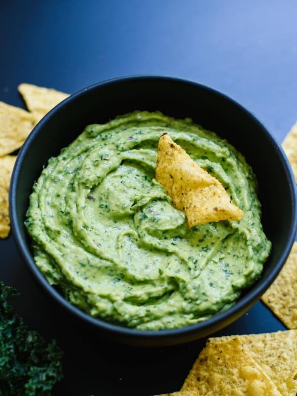 Kale guacamole! It's so easy to make in a food processor. cookieandkate.com