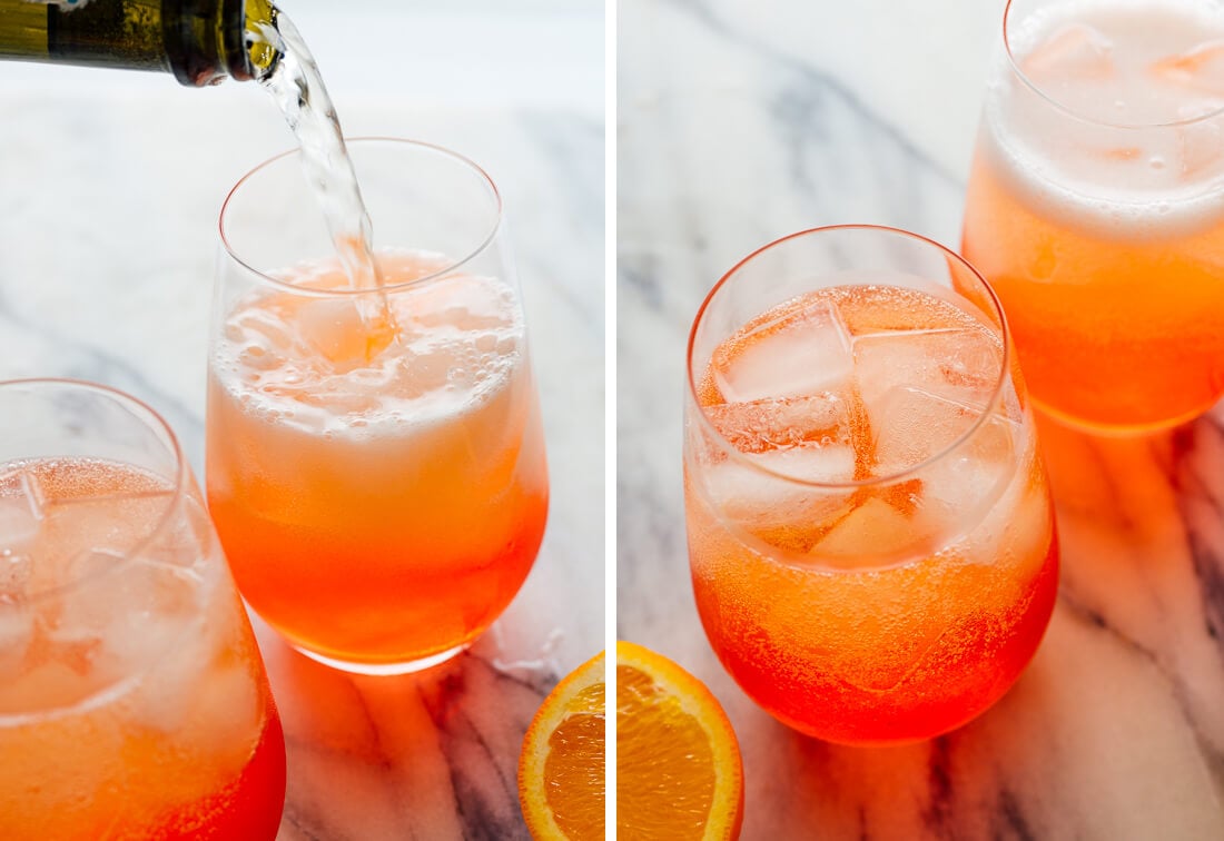 pouring prosecco into aperol spritz