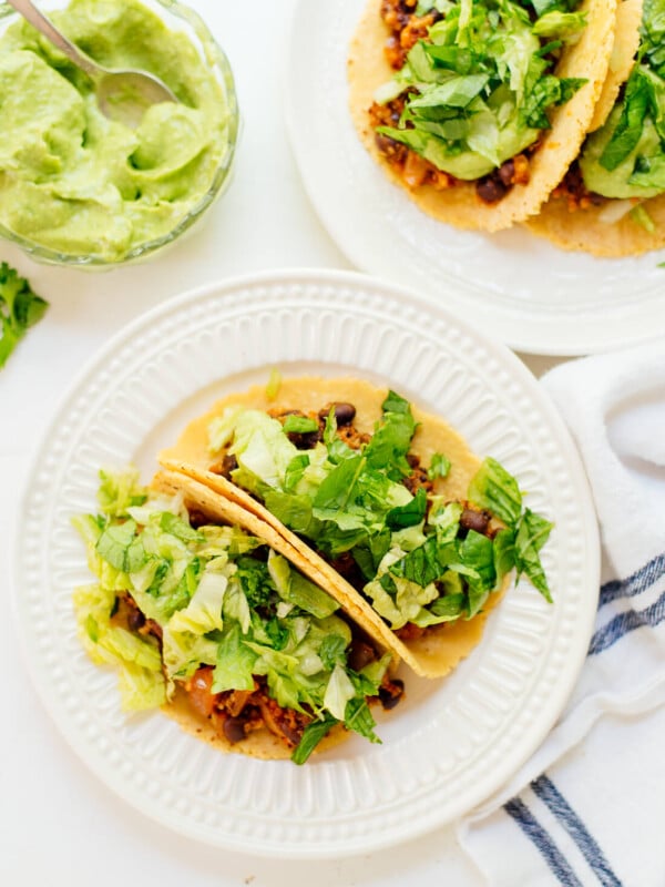 Quinoa black bean tacos with avocado crema