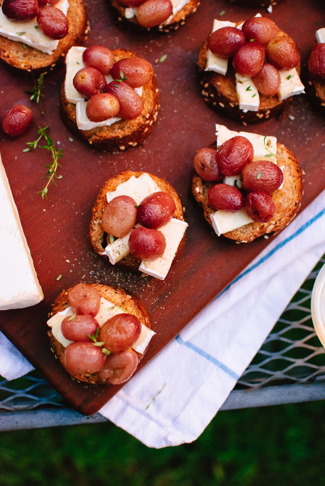 Jammy roasted grapes on brie and toast make a simple, seasonal appetizer!