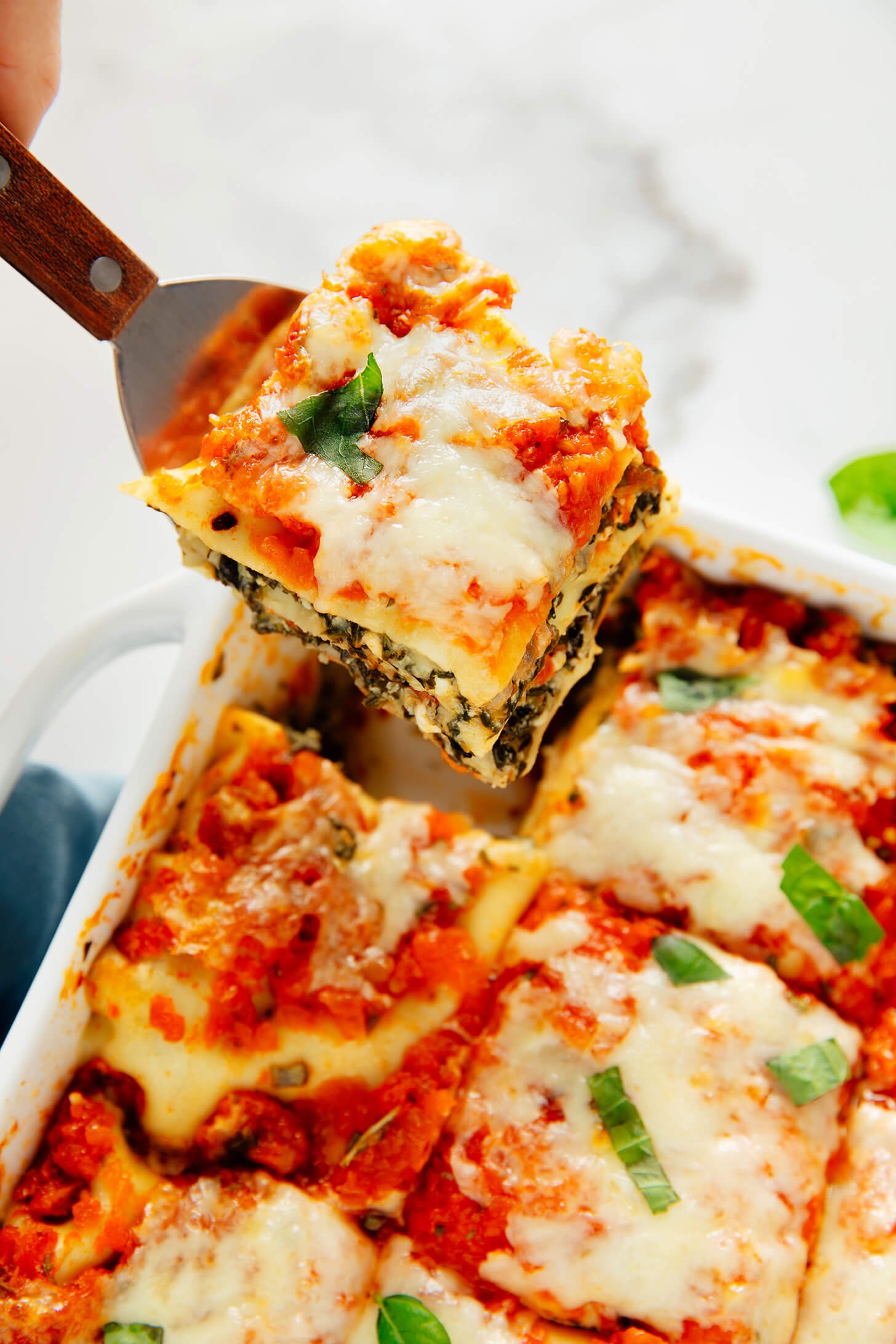 slice of spinach artichoke lasagna