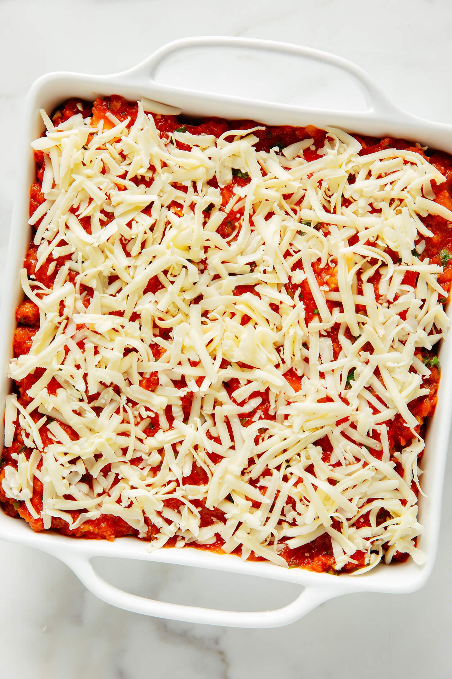 spinach artichoke lasagna before baking