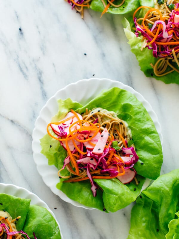 These healthy lettuce wraps are colorful, fun to eat, and so delicious! They're vegetarian/vegan, and easily gluten free. Get the recipe at cookieandkate.com